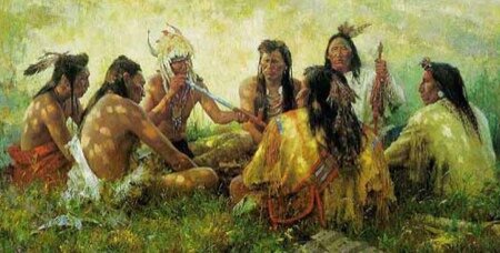 Indiani che fumano la pipa rituale